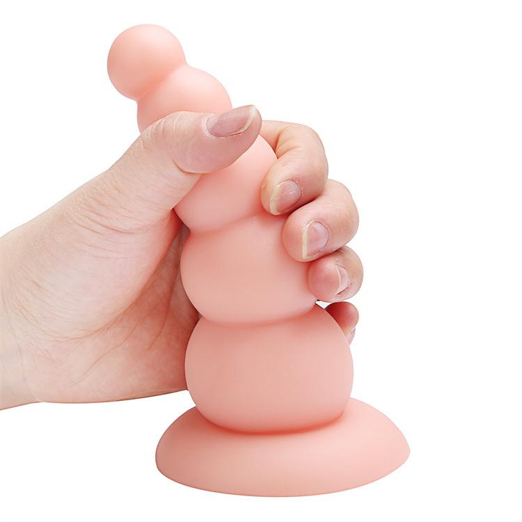 Jumbo simulated penis anal plug with pulling beads